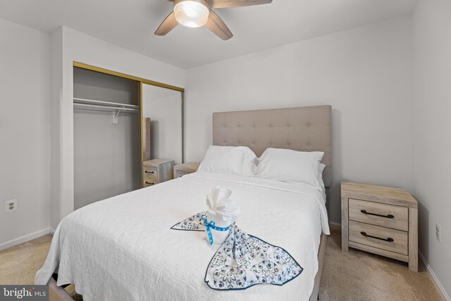 9761 Turnbuckle Dr, Burke, VA 22015 - carpeted bedroom featuring a closet, baseboards, and a ceiling fan