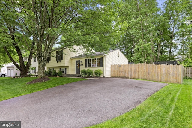 9761 Turnbuckle Dr, Burke, VA 22015 - tri-level home featuring driveway