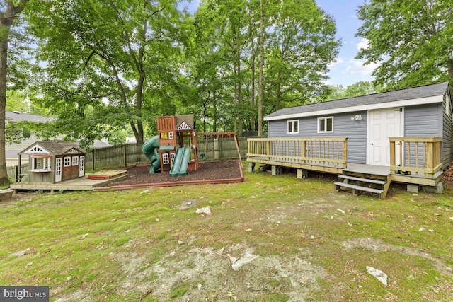 9761 Turnbuckle Dr, Burke, VA 22015 - view of yard featuring a wooden deck and a playground