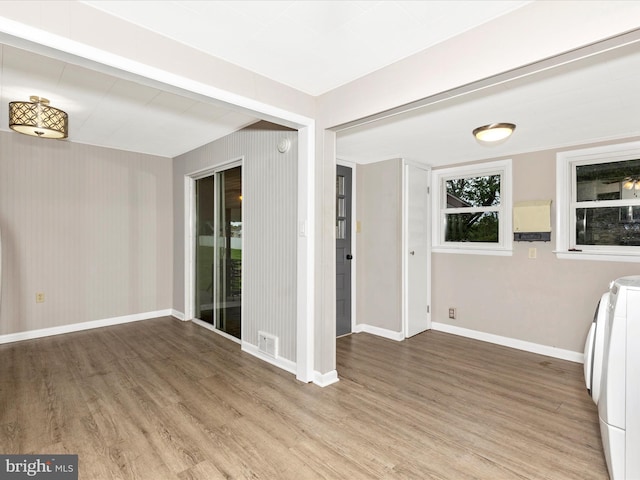 510 E Main St, Emmitsburg, MD 21727 - unfurnished room featuring washer and dryer, light wood-type flooring, and baseboards