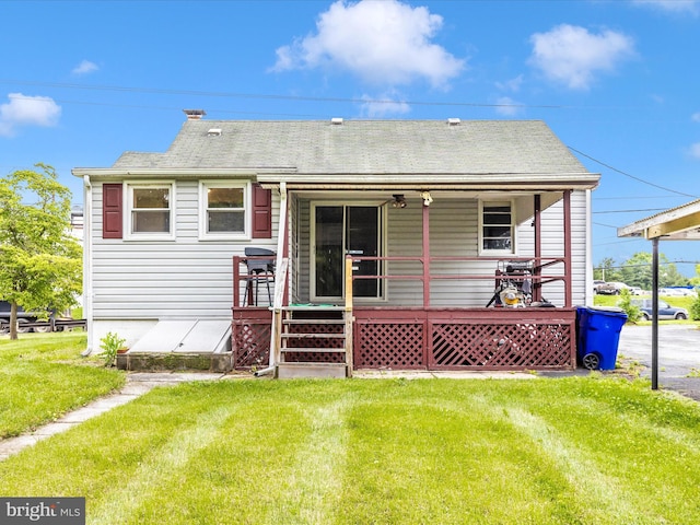 510 E Main St, Emmitsburg, MD 21727 - view of front of home featuring a front lawn, roof with shingles, and covered porch