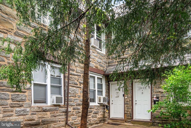 1826 N 52nd St, Philadelphia, PA 19131 - property entrance featuring stone siding and cooling unit