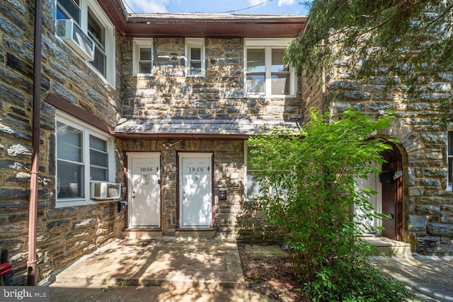 1826 N 52nd St, Philadelphia, PA 19131 - property entrance featuring stone siding and cooling unit