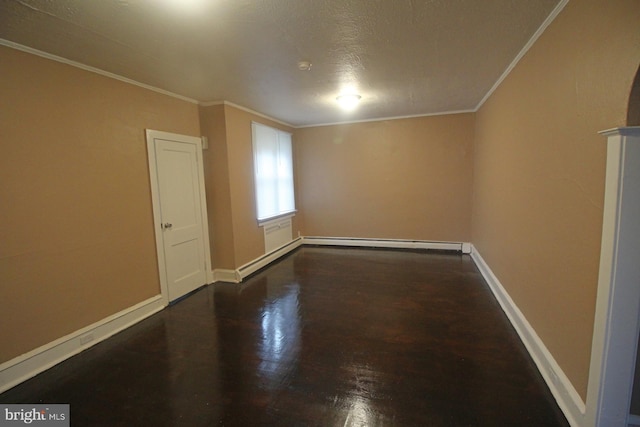 1826 N 52nd St, Philadelphia, PA 19131 - spare room with wood finished floors, a baseboard radiator, ornamental molding, and baseboards