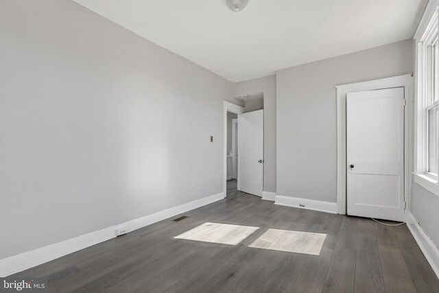 3532 Lucille Ave, Baltimore, MD 21215 - unfurnished bedroom featuring wood finished floors and baseboards