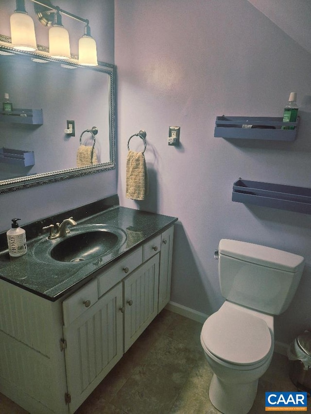 566 Holman Mill Rd, Farmville, VA 23901 - half bathroom featuring toilet, vanity, and baseboards