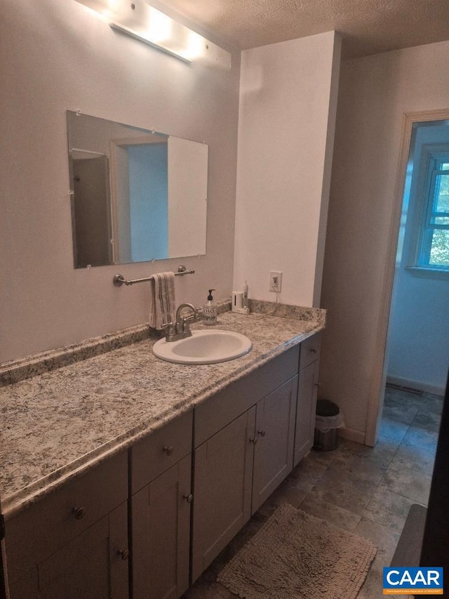 566 Holman Mill Rd, Farmville, VA 23901 - bathroom featuring vanity and a textured ceiling
