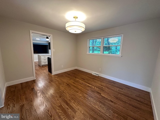 215 Bridge Rd, Upper Chichester, PA 19061 - unfurnished room with dark wood-style flooring and baseboards
