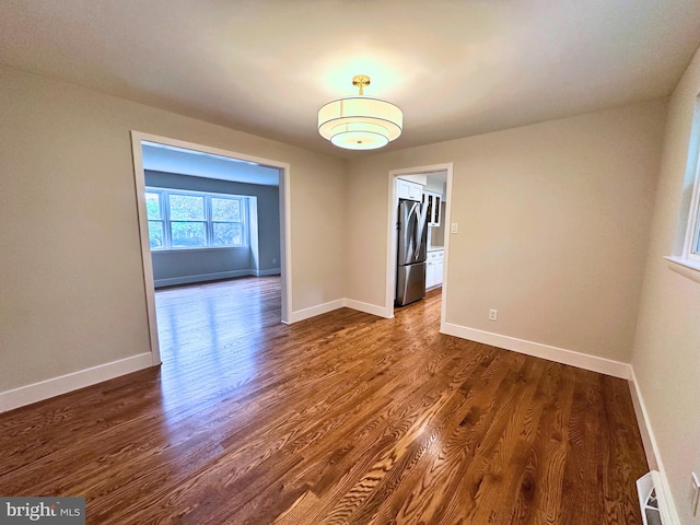 215 Bridge Rd, Upper Chichester, PA 19061 - unfurnished room featuring dark wood-style floors and baseboards