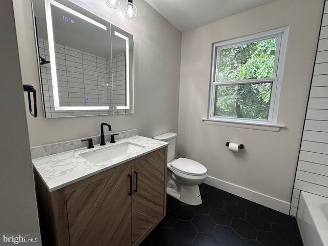 215 Bridge Rd, Upper Chichester, PA 19061 - full bath featuring toilet, tile patterned flooring, vanity, and a shower