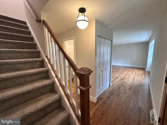 215 Bridge Rd, Upper Chichester, PA 19061 - staircase featuring wood finished floors and baseboards
