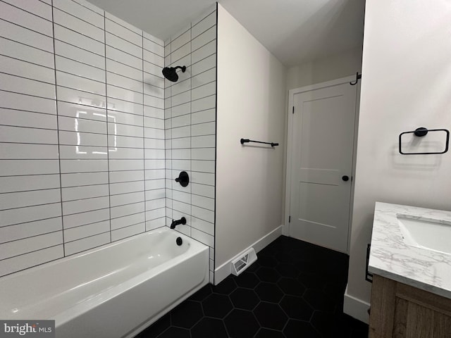 215 Bridge Rd, Upper Chichester, PA 19061 - bathroom with tile patterned flooring, vanity, baseboards, and shower / washtub combination