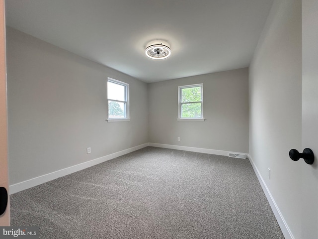 215 Bridge Rd, Upper Chichester, PA 19061 - unfurnished room featuring baseboards and carpet