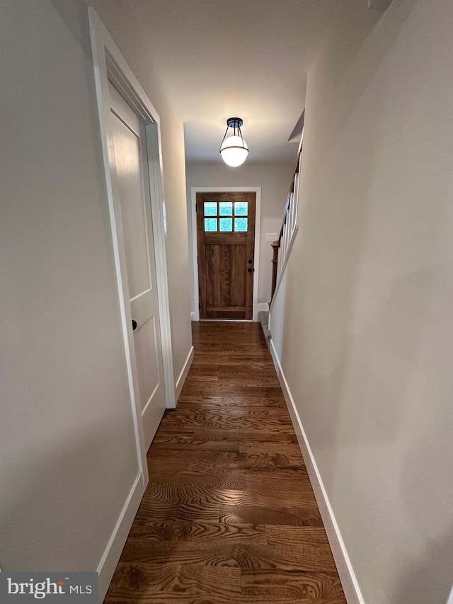 215 Bridge Rd, Upper Chichester, PA 19061 - entryway featuring baseboards and dark wood finished floors