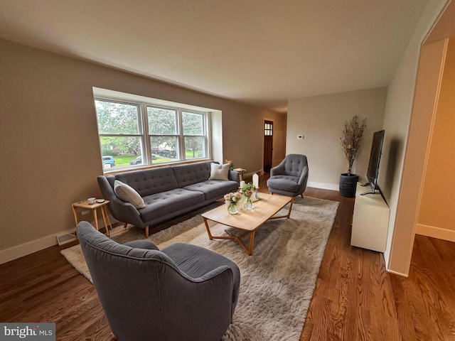 215 Bridge Rd, Upper Chichester, PA 19061 - living area featuring baseboards and wood finished floors