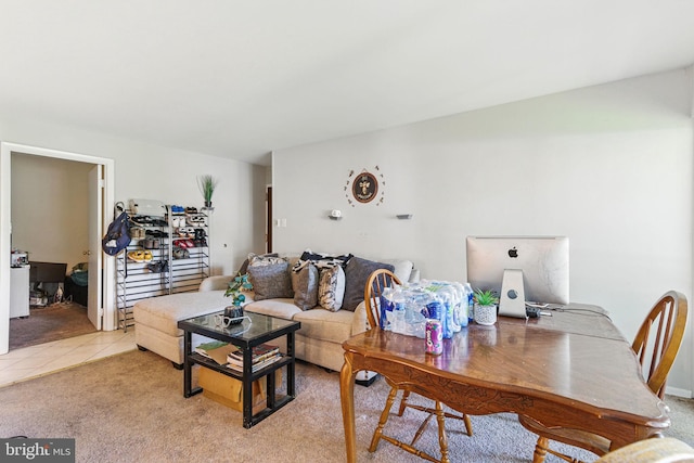 living area with light tile patterned floors