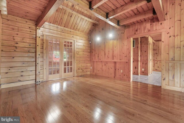 21142 Westerly Rd, Poolesville, MD 20837 - spare room with wooden ceiling, wood walls, wood finished floors, and french doors