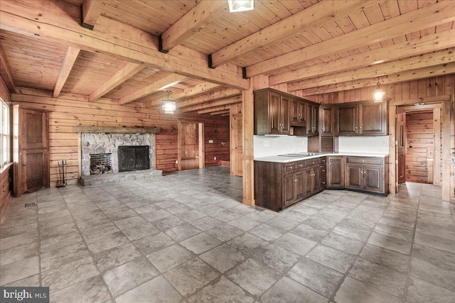 21142 Westerly Rd, Poolesville, MD 20837 - kitchen with a wood ceiling with exposed beams, wood walls, light countertops, dark brown cabinets, and open floor plan
