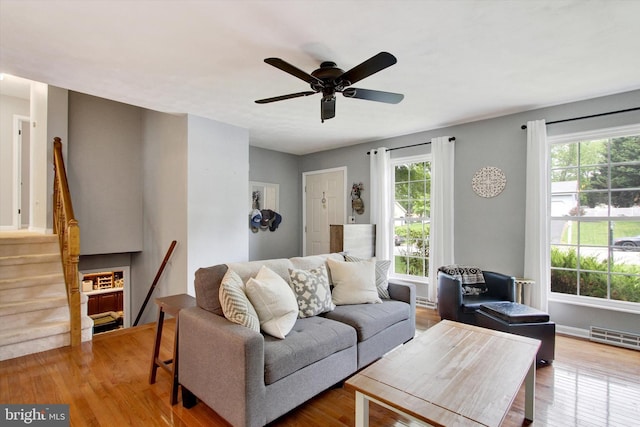 325 Jasmine Dr, Hanover, PA 17331 - living area featuring wood finished floors, ceiling fan, and baseboards
