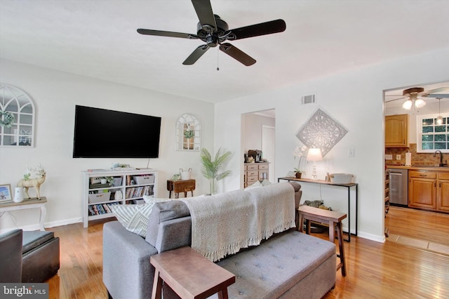 325 Jasmine Dr, Hanover, PA 17331 - living room featuring ceiling fan, light wood-style flooring, and baseboards