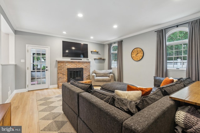 520 Perry Dr, Mount Laurel, NJ 08054 - living area featuring light wood-style floors, crown molding, plenty of natural light, recessed lighting, and a fireplace