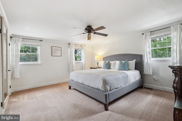 520 Perry Dr, Mount Laurel, NJ 08054 - carpeted bedroom with multiple windows, baseboards, ornamental molding, and ceiling fan