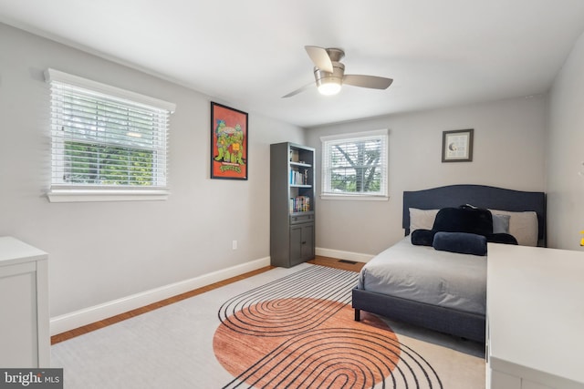 520 Perry Dr, Mount Laurel, NJ 08054 - bedroom featuring light wood finished floors, baseboards, and a ceiling fan