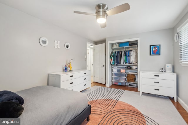 520 Perry Dr, Mount Laurel, NJ 08054 - bedroom with wood finished floors, a closet, a ceiling fan, and baseboards