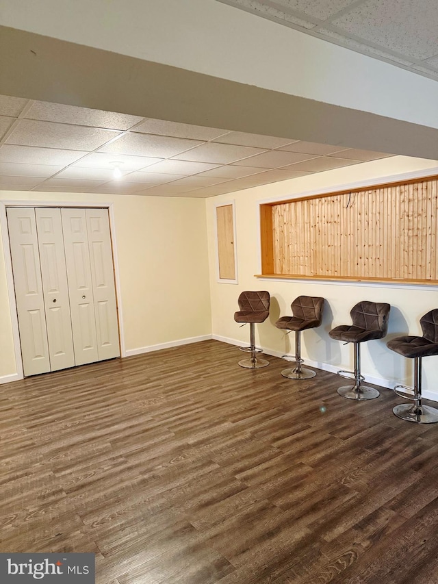 323 Swatara Creek Dr, Jonestown, PA 17038 - below grade area featuring a drop ceiling, baseboards, and wood finished floors