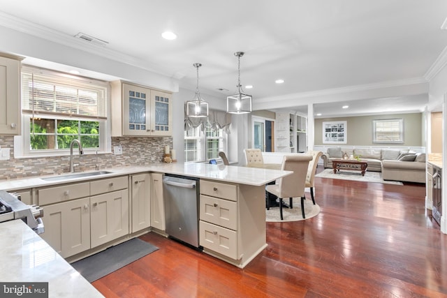 602 Tallowood Ln, Mount Laurel, NJ 08054 - kitchen featuring dishwasher, a sink, ornamental molding, dark wood finished floors, and a peninsula