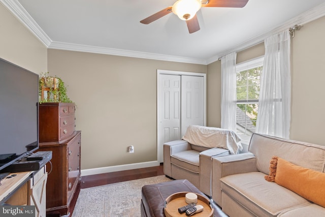 602 Tallowood Ln, Mount Laurel, NJ 08054 - living area with ornamental molding, wood finished floors, ceiling fan, and baseboards