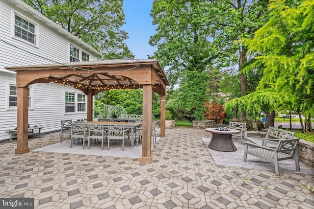 602 Tallowood Ln, Mount Laurel, NJ 08054 - view of patio / terrace featuring a gazebo, a fire pit, and outdoor dining area