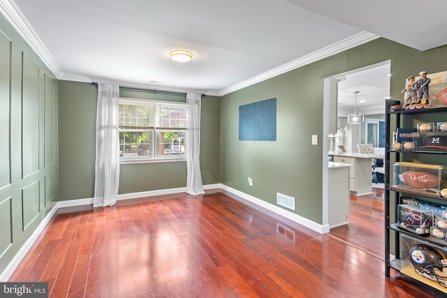 602 Tallowood Ln, Mount Laurel, NJ 08054 - empty room with wood finished floors, crown molding, and baseboards