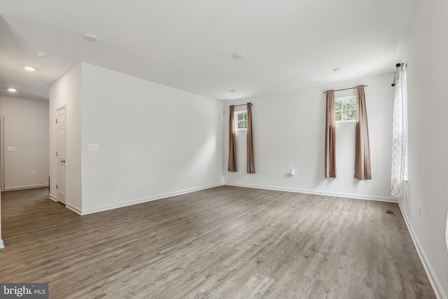 11041 Lee St, King George, VA 22485 - empty room with wood finished floors, baseboards, and recessed lighting