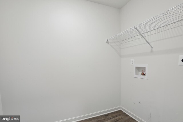 11041 Lee St, King George, VA 22485 - laundry room with hookup for an electric dryer, washer hookup, baseboards, and dark wood-style floors