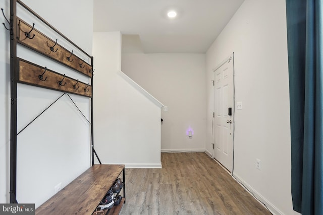 11041 Lee St, King George, VA 22485 - foyer entrance featuring wood finished floors, baseboards, and stairway