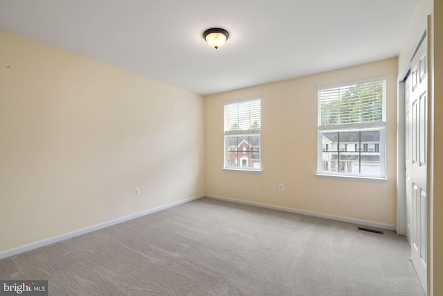 9235 Stephanie St, Manassas Park, VA 20111 - carpeted empty room featuring baseboards