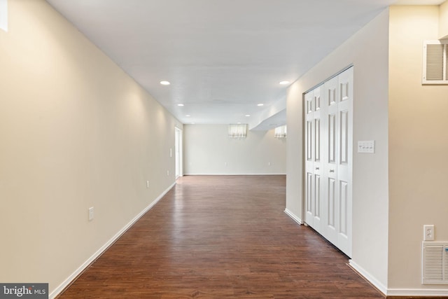 9235 Stephanie St, Manassas Park, VA 20111 - hallway with dark wood-style flooring, recessed lighting, and baseboards
