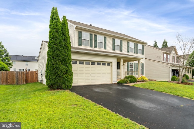 9235 Stephanie St, Manassas Park, VA 20111 - traditional home with asphalt driveway and an attached garage