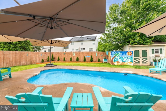 9235 Stephanie St, Manassas Park, VA 20111 - view of swimming pool with a fenced backyard and a patio