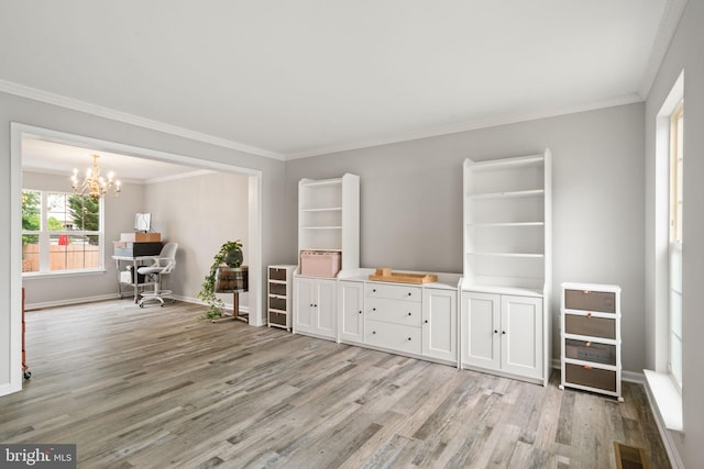 9235 Stephanie St, Manassas Park, VA 20111 - living room featuring light wood finished floors, a chandelier, crown molding, baseboards, and a desk