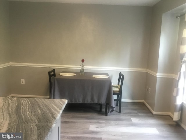 7709 Gromwell Ct, Springfield, VA 22152 - dining space featuring wood finished floors and baseboards