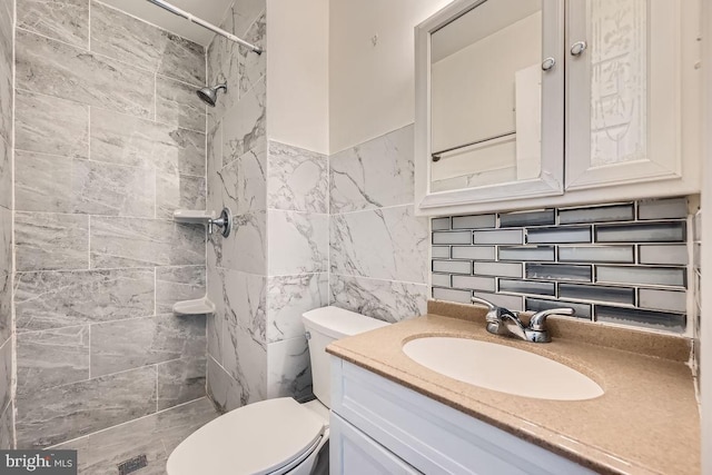 1571 Charlestown Dr, Edgewood, MD 21040 - bathroom with tiled shower, tile walls, toilet, vanity, and tasteful backsplash