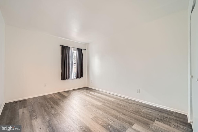 1571 Charlestown Dr, Edgewood, MD 21040 - empty room with dark wood finished floors and baseboards