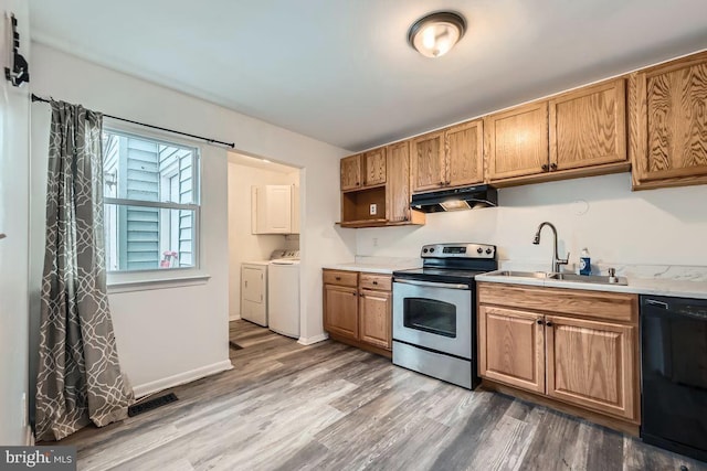1571 Charlestown Dr, Edgewood, MD 21040 - kitchen with electric stove, dishwasher, washer and clothes dryer, a sink, and under cabinet range hood