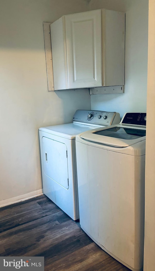 1571 Charlestown Dr, Edgewood, MD 21040 - laundry room featuring separate washer and dryer, cabinet space, dark wood-style flooring, and baseboards