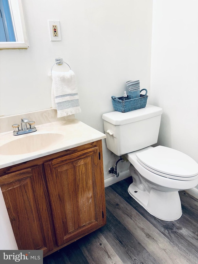 1571 Charlestown Dr, Edgewood, MD 21040 - half bath with toilet, wood finished floors, and vanity