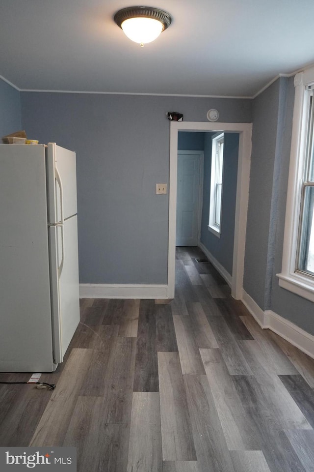1506 Centre Ave, Reading, PA 19601 - kitchen featuring freestanding refrigerator, dark wood-type flooring, baseboards, and ornamental molding