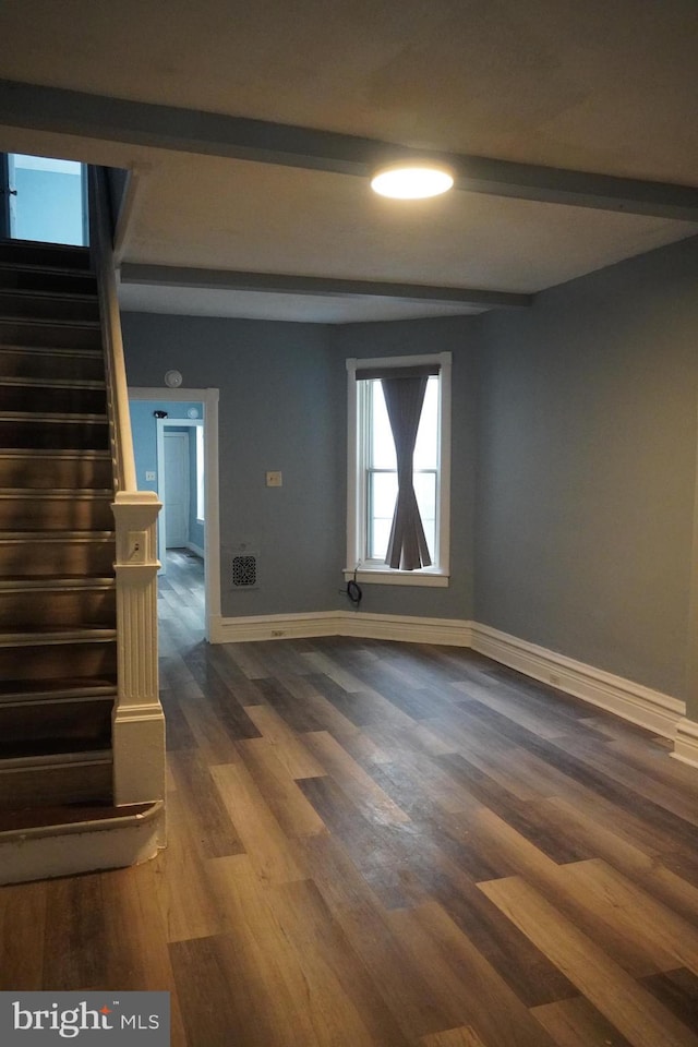 1506 Centre Ave, Reading, PA 19601 - empty room with beamed ceiling, baseboards, dark wood finished floors, and stairs