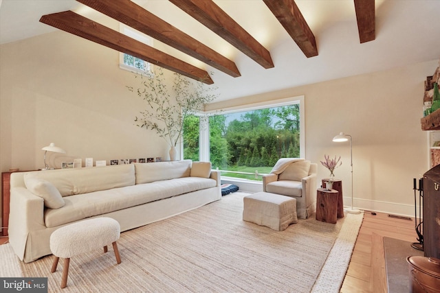 2320 Turk Rd, Doylestown, PA 18901 - living area featuring beamed ceiling, baseboards, and light wood-style floors